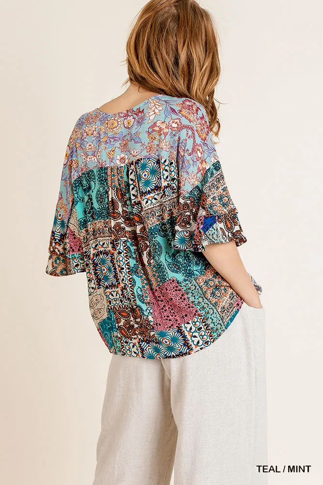 Umgee Mixed Print Layered Ruffle Sleeve V-Neck Crossbody Top with Scoop Hem